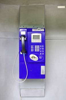 Blue public phone in Bangkok, Thailand