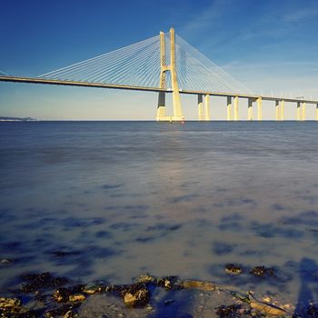 evening on Vasco da Gama bridge in Lisbon, Portugal 