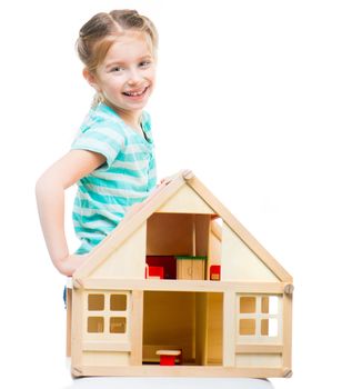 girl with a toy house isolated on a white background