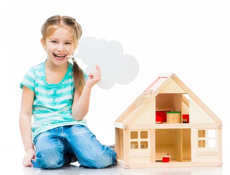 little smiling girl with a toy house holding cloud talk