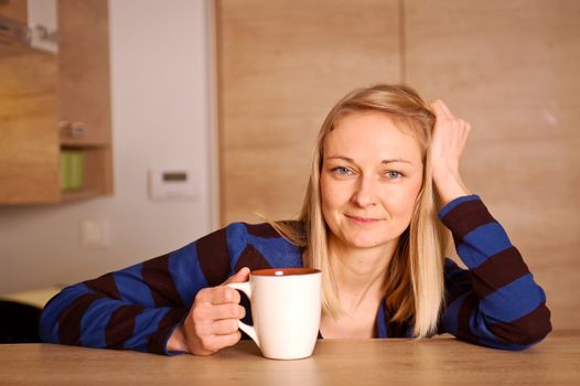 Young woman enjoying her tea break
