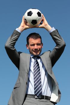 coach with ball in the hands