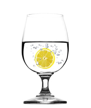 Glass of water with lemon -concept