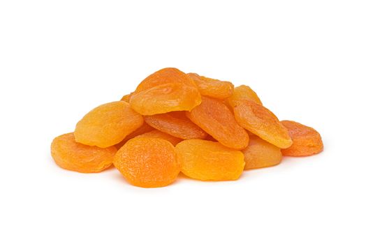 A heap of dried apricots on a white background