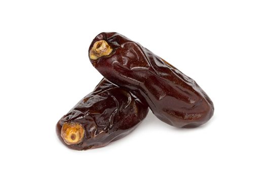 dryed dates on white background