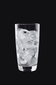A glass with ice cubes