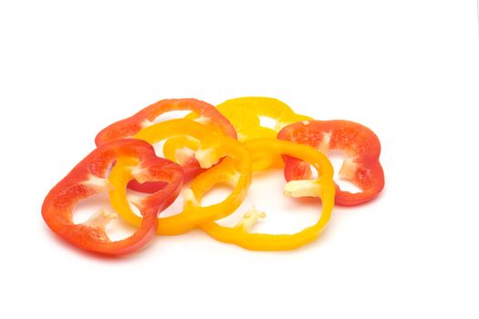 Sweet red sliced pepper isolated on white background