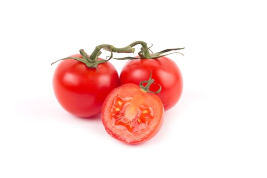 Fresh tomatoes isolated on white