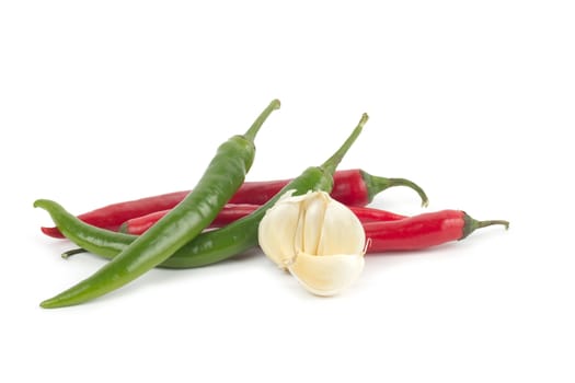 Chili pepper and garlic isolated on white background