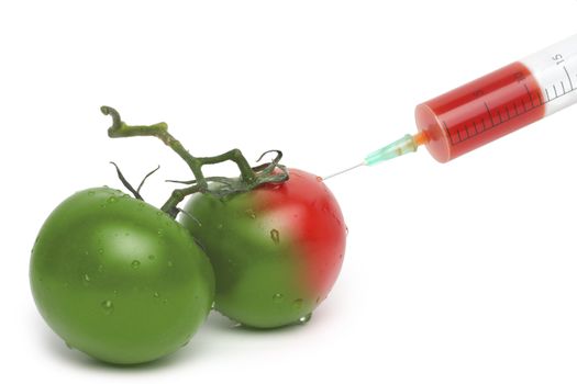 Filed syringe and green with red tomatoes
