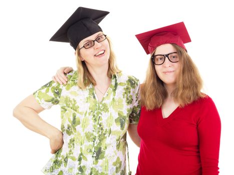 Two happy female graduates