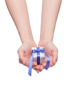 christmas gift with decorative blue ribbon bow