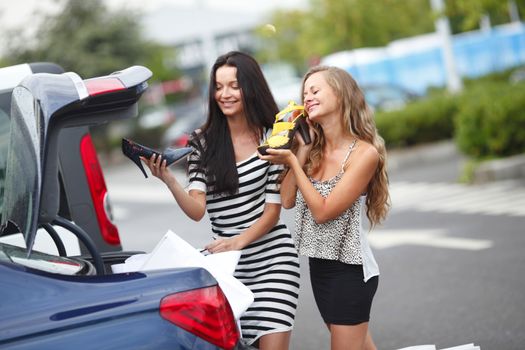 Two woman after shopping