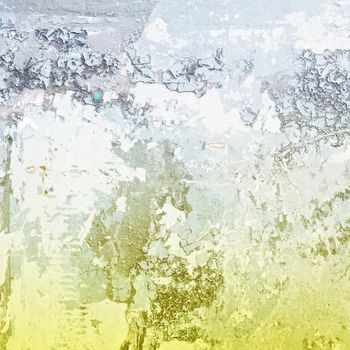 A grungy texture with yellow and blue tones