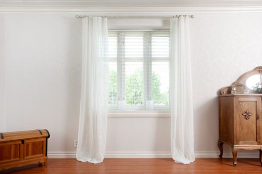 Interior in a modern house with old furnitue