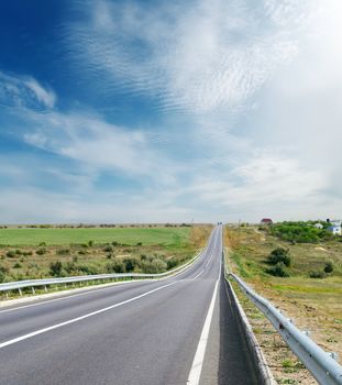 road to horizon and sky with clouds