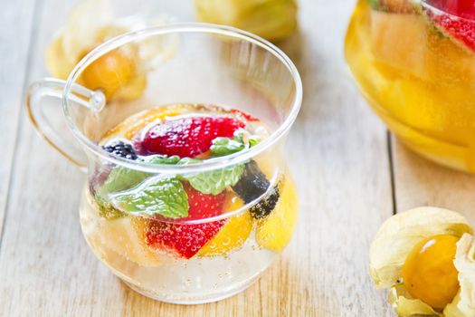 Varieties of fruits with mint and lemonade