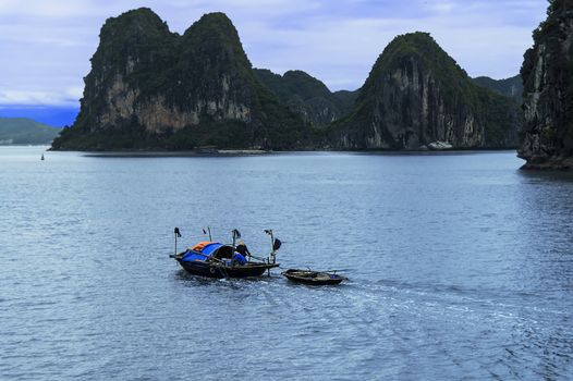 Fishing boat in Halong Bay. North Vietnam.