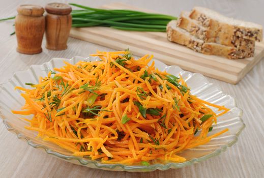 Carrot salad with green onion and dill