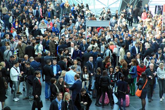 People enter Salone Internazionale del Mobile - International home furnishing and accessories exhibition