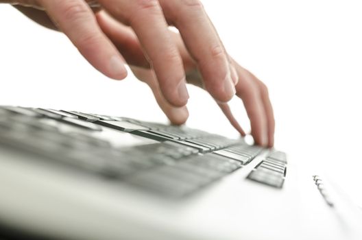 Closeup of blurred  male hands typing on computer keyboard. 