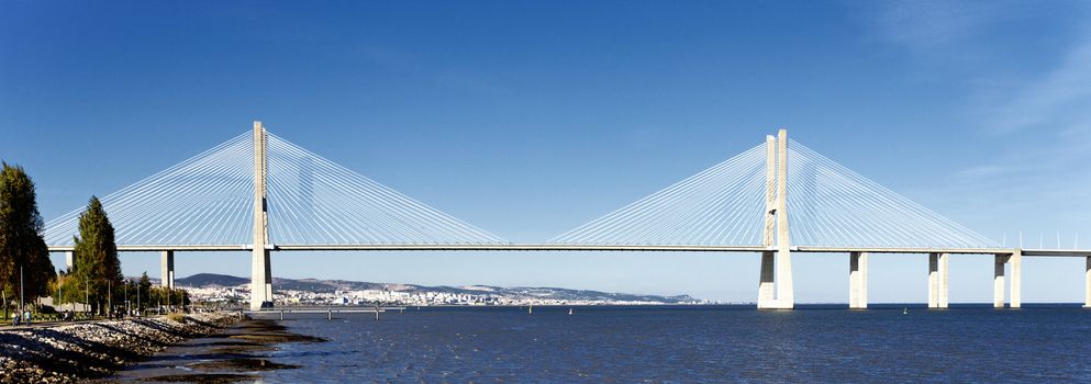 panoramic viw of Vasco da Gama bridge in Lisbon, Portugal