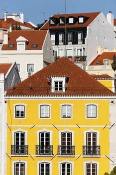facades of different colored houses in Lisbon 