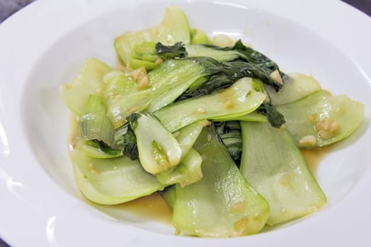 Chinese Bok Choy Green Vegetables Stir Fry with Garlic and Soy Sauce Dish