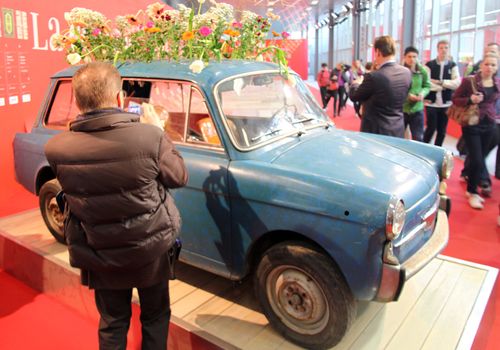 Vintage Fiat Bianchina installation at Salone Internazionale del Mobile - International home furnishing and accessories exhibition