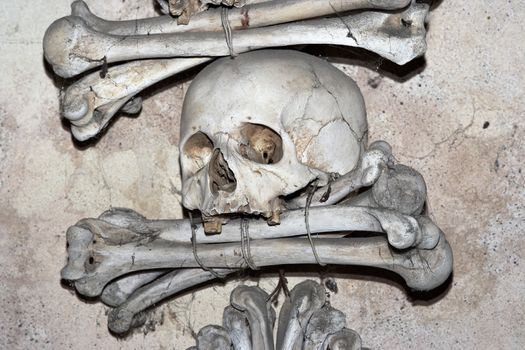 The Sedlec Ossuary is a small Roman Catholic chapel, located beneath the Cemetery Church of All Saints in Sedlec, a suburb of Kutna Hora in the Czech Republic. The ossuary is estimated to contain the skeletons of between 40 000 and 70 000 people, many of whom have had their bones artistically arranged to form decorations and furnishings for the chapel.
Kutna Hora, Sedlec, Czech republic.
