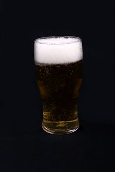 Beer Glass  isolated on a  black  background