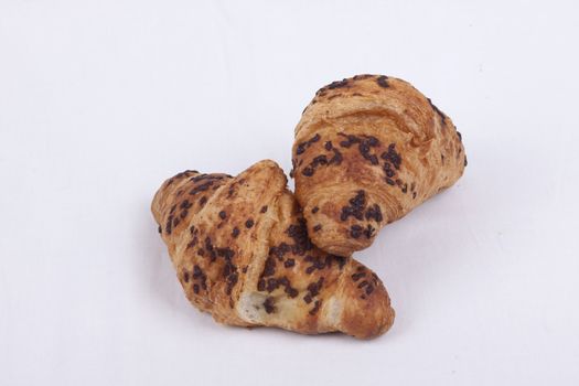 fresh chocolate croissant isolated on a white  background