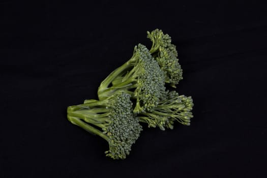 broccoli isolated on black background