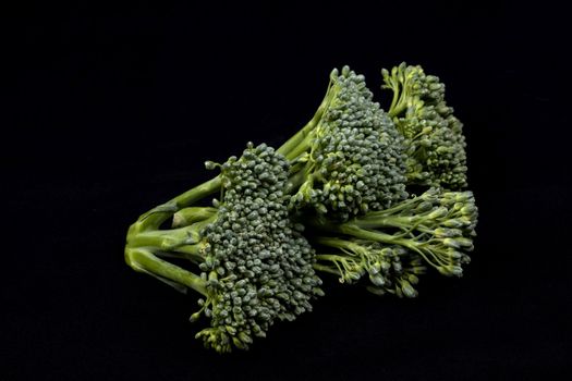 broccoli isolated on black background