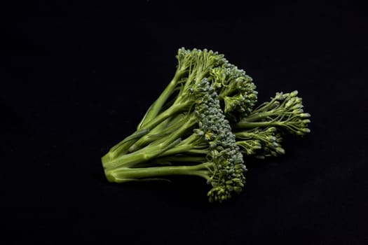 broccoli isolated on black background