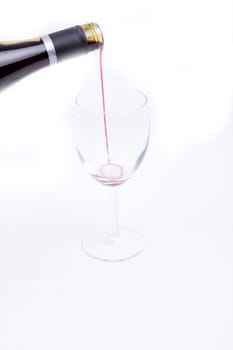 A glass of red wine isolated on white background,