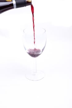 A glass of red wine isolated on white background,