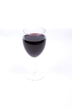 A glass of red wine isolated on white background,