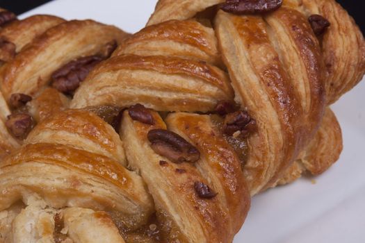 pecan and mapel pastries on a plate