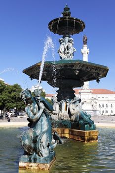 Famous fountain on rossio square the liveliest placa in Lisbon 
