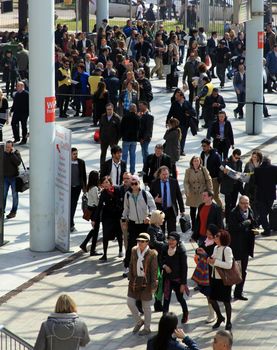 People enter Salone Internazionale del Mobile - International home furnishing and accessories exhibition