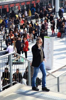 People enter Salone Internazionale del Mobile - International home furnishing and accessories exhibition