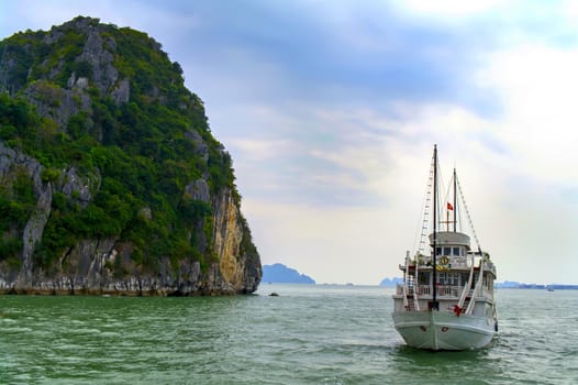 The Ship and the Rock.  Ha Long Bay, Vietnam.