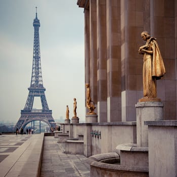 view from Trocadero with golden statues on Eiffel tower, Paris