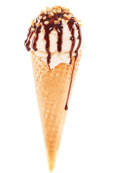 vanilla flavor ice cream in a cone with chocolate sauce and brittle on white background