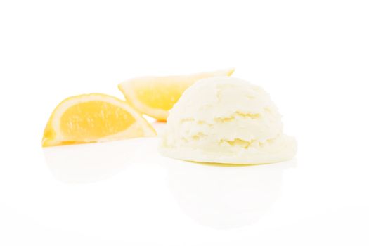 lemon flavored ice cream with lemon slices on white background