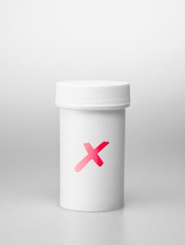 Small white medecine bottle