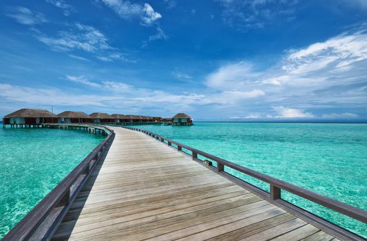 Beautiful beach with water bungalows at Maldives