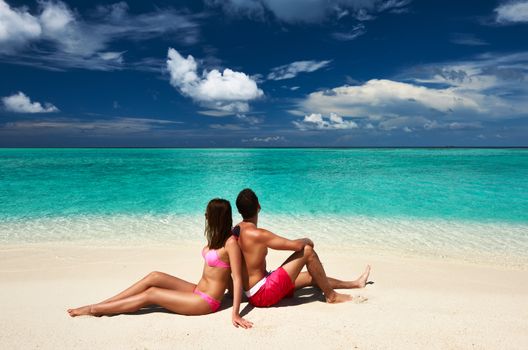 Couple on a tropical beach at Maldives