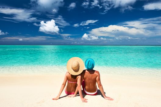 Couple on a tropical beach at Maldives